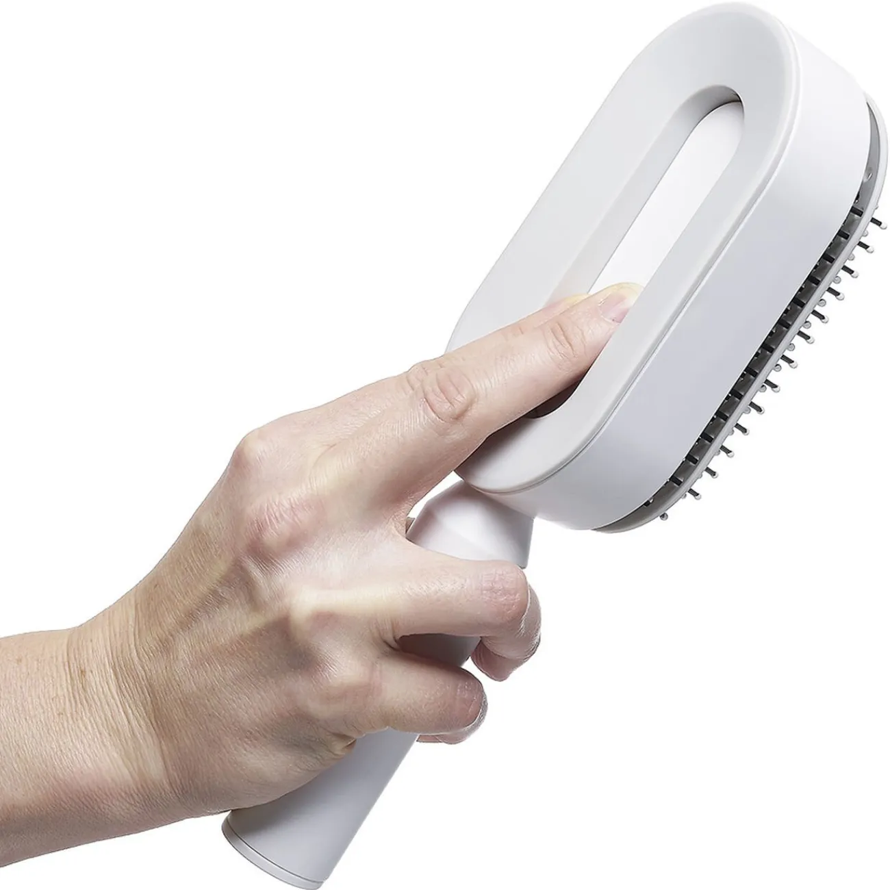 Gifi Beauté^Brosse à cheveux autonettoyante