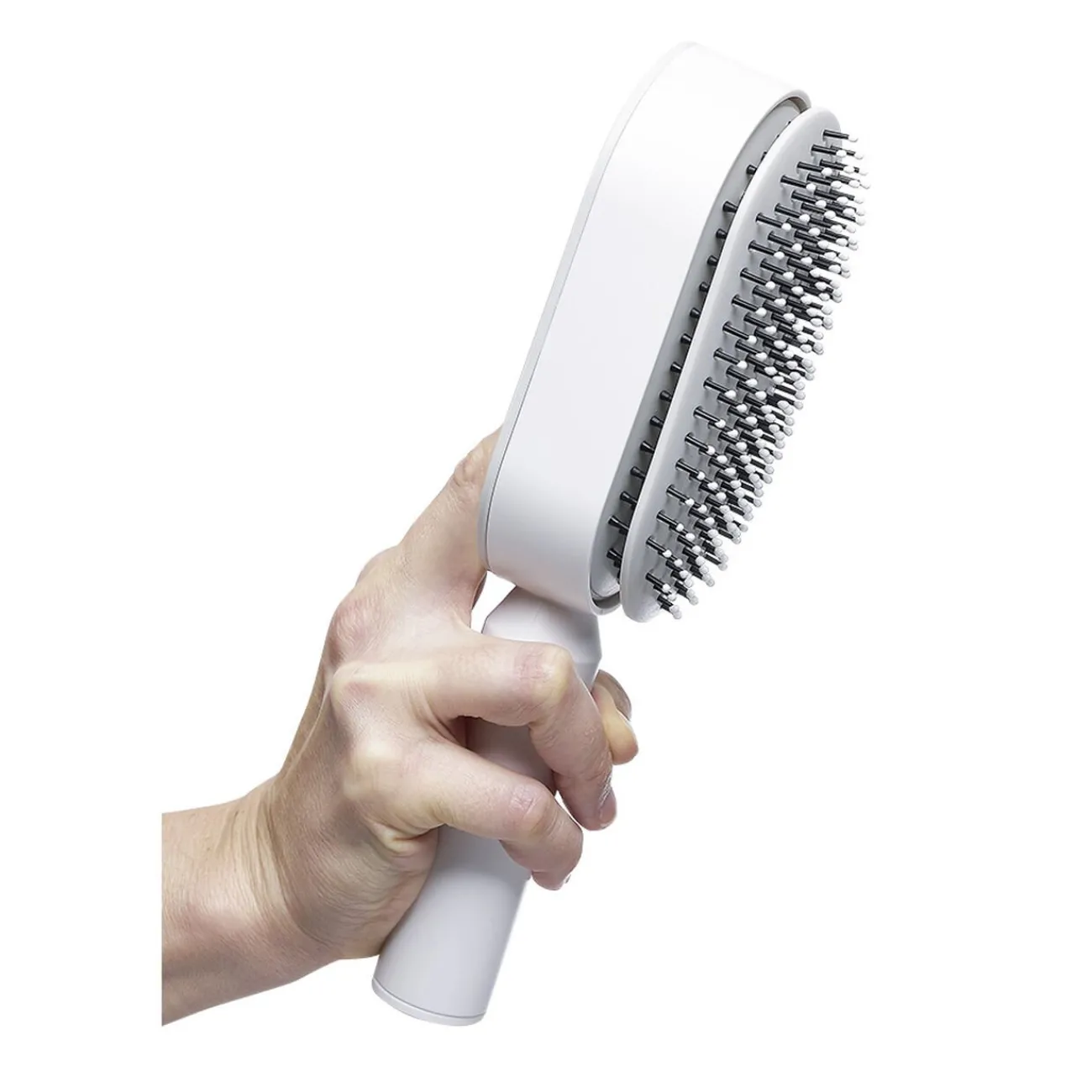 Gifi Beauté^Brosse à cheveux autonettoyante