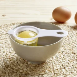 Gifi Séparateur blanc d'oeuf plastique bleu ou rose